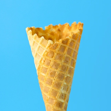This is a gallery image of a cone without ice with an blue background.